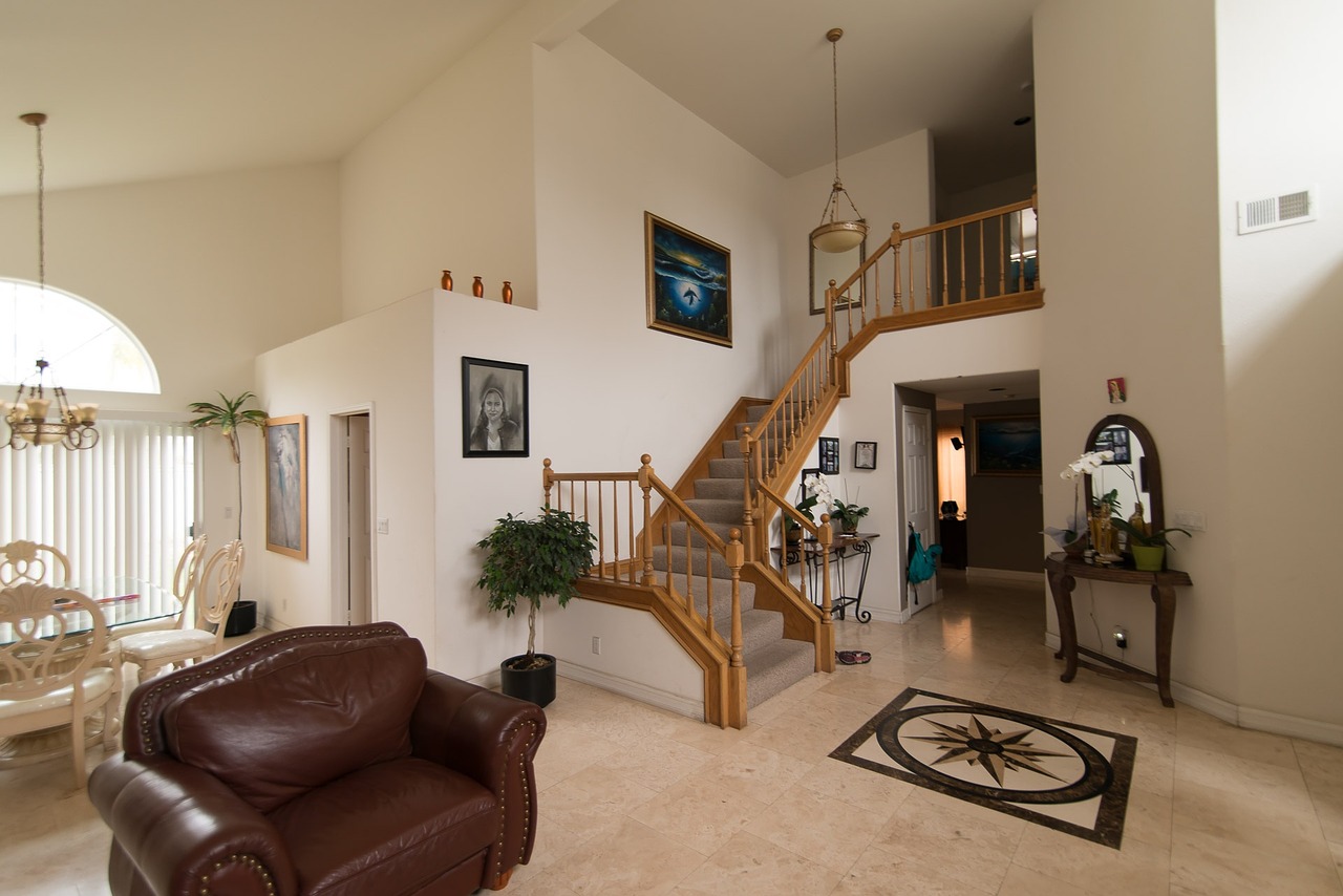 Staircase and lounge room inside home